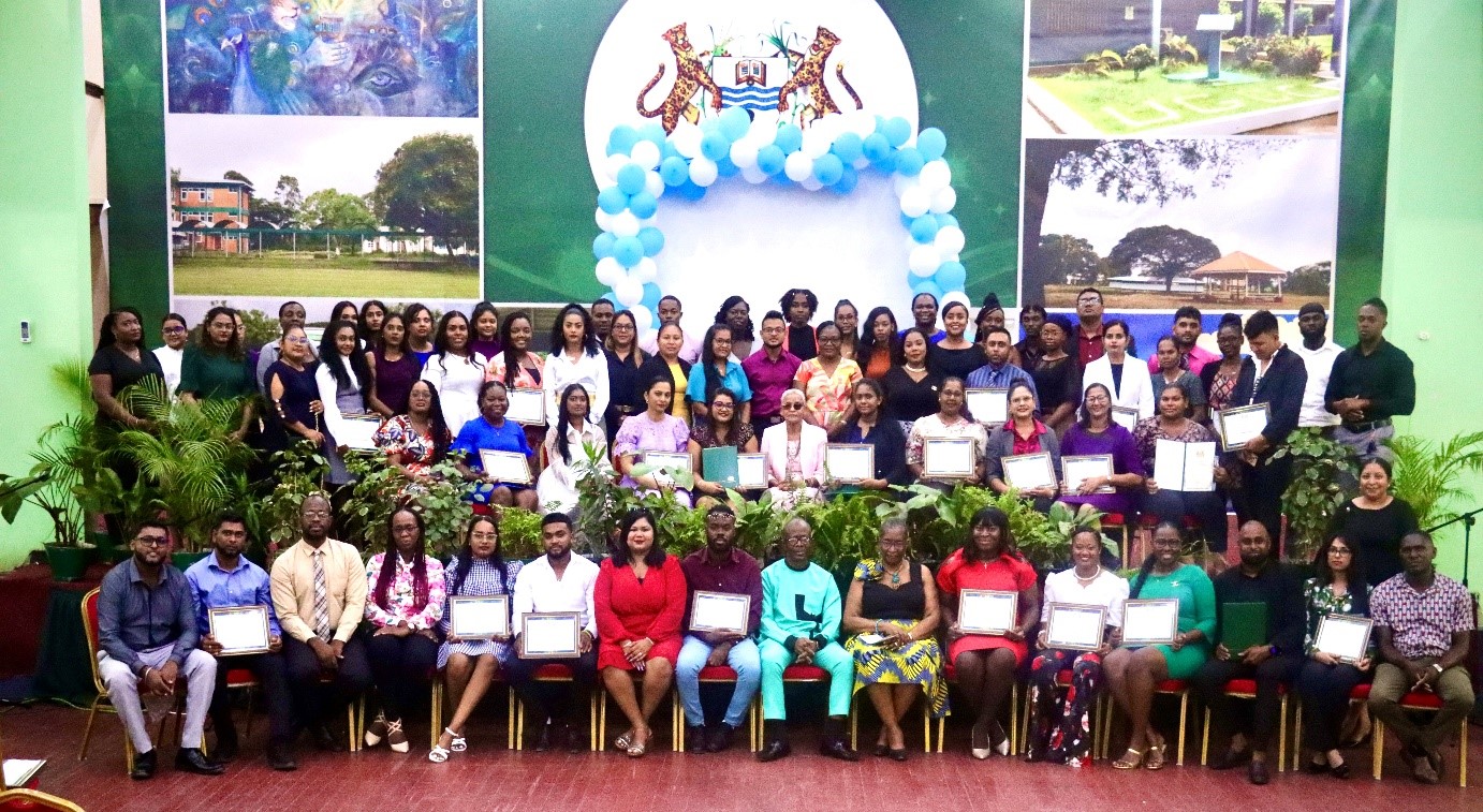 Vice-Chancellor Professor Paloma Mohamed Martin (first, right, standing) along with FEH staff  andstudents at the Awards and Prize-giving ceremony.